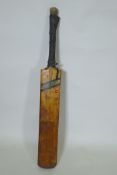 A Slazenger cricket bat, signed with players autographs, Pakistan 1971, Derbyshire, Surrey,