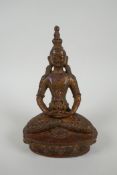 A Tibetan gilt bronze figure of Buddha holding a stupa, 20cm long