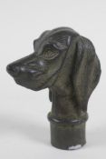 A bronze walking stick handle in the form of a Spaniel, 7cm