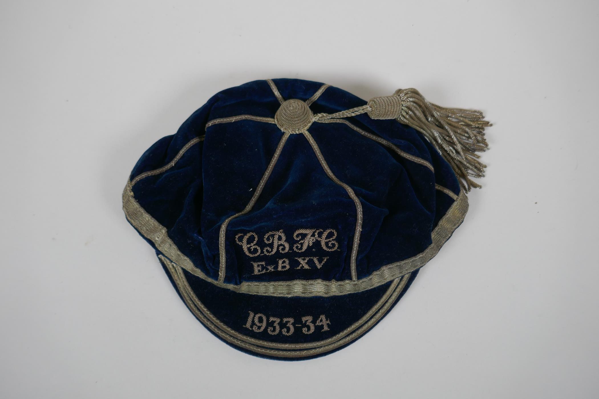 A pre WWII Rugby Union blue velvet cap for the 1933-34 season, with silver embroidered club initials