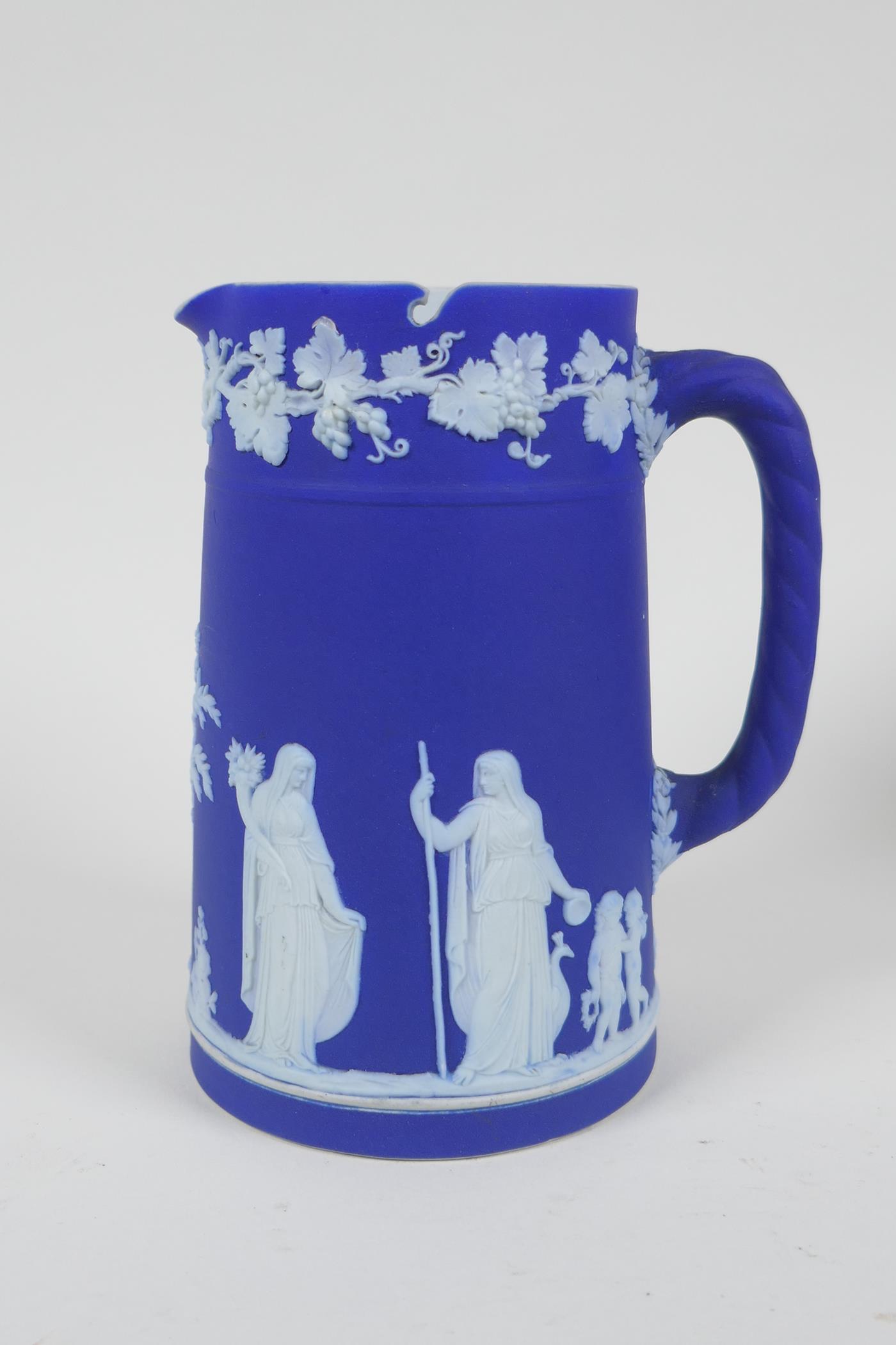 A collection of Antique Wedgwood Jasperware including a teapot, jugs, saucers, vases etc, AF, teapot - Image 5 of 8