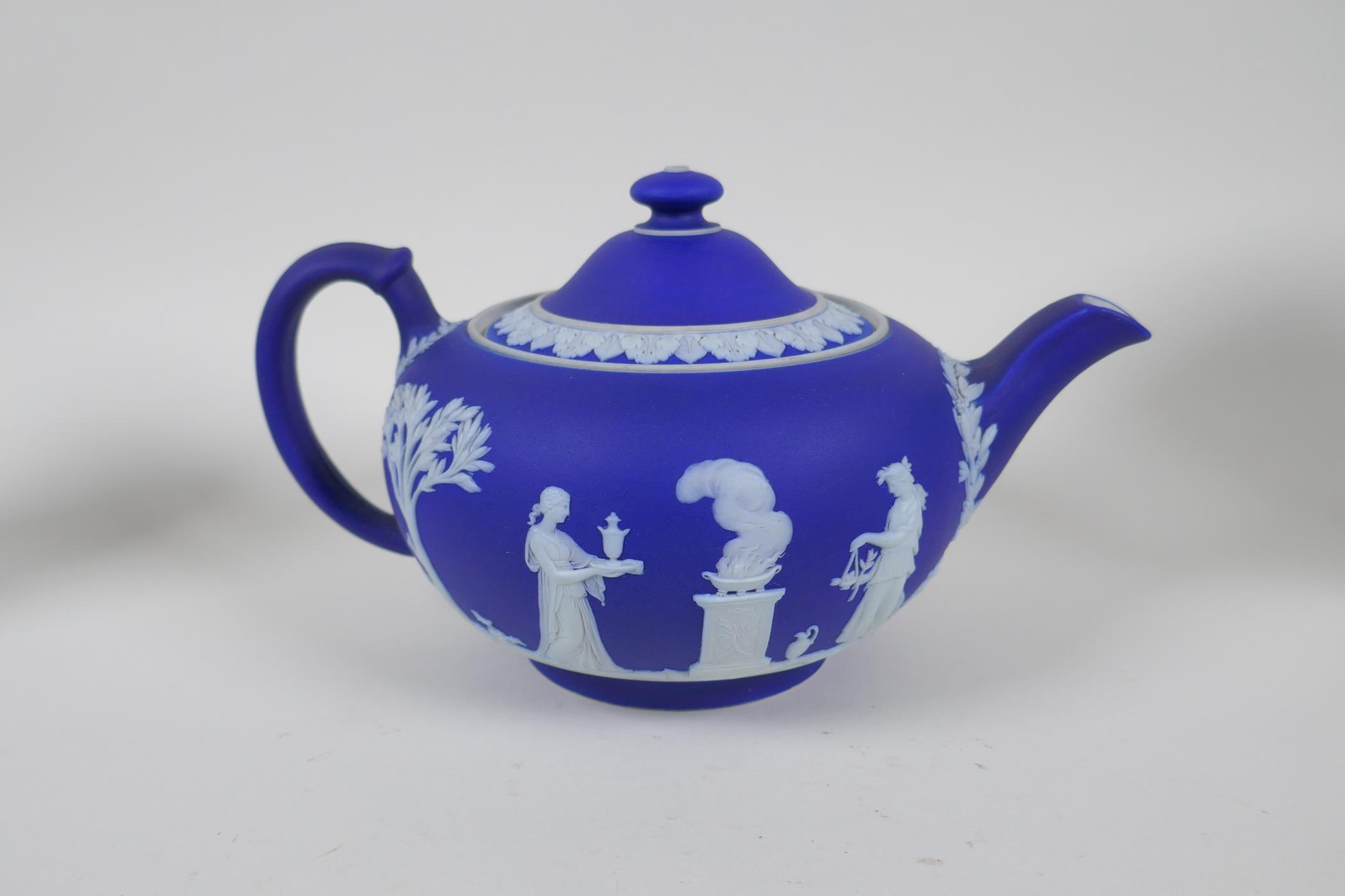 A collection of Antique Wedgwood Jasperware including a teapot, jugs, saucers, vases etc, AF, teapot - Image 3 of 8