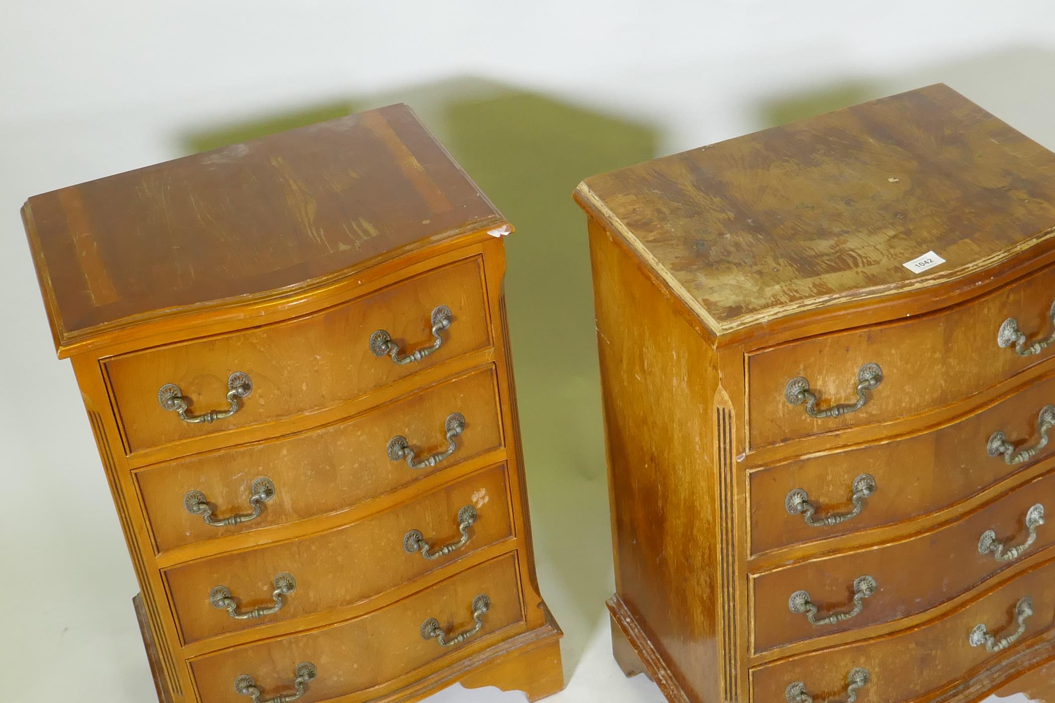 A pair of serpentine front yew wood veneered bedside chests of four drawers with brass handles, - Image 3 of 3