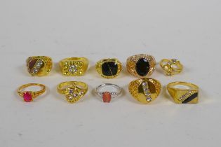 Ten gilt metal and white metal costume rings, various sizes