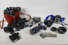 A quantity of vintage cameras and equipment, including a Canon Coronet 28, a Canon AV 1, a Pentax ME