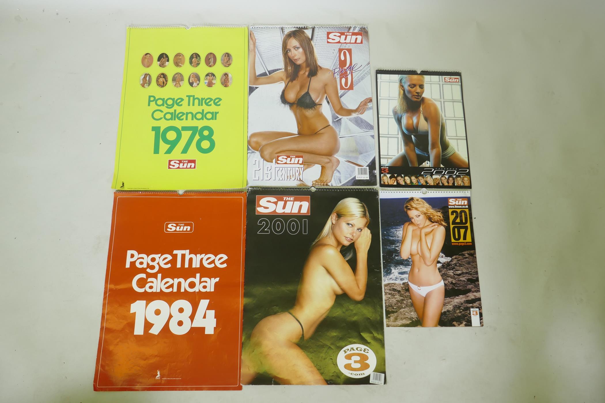 Six 'Sun, Page 3' calendars, 1978, 1984, 2000, 2001, 2002 and 2007, largest 42 x 58cm