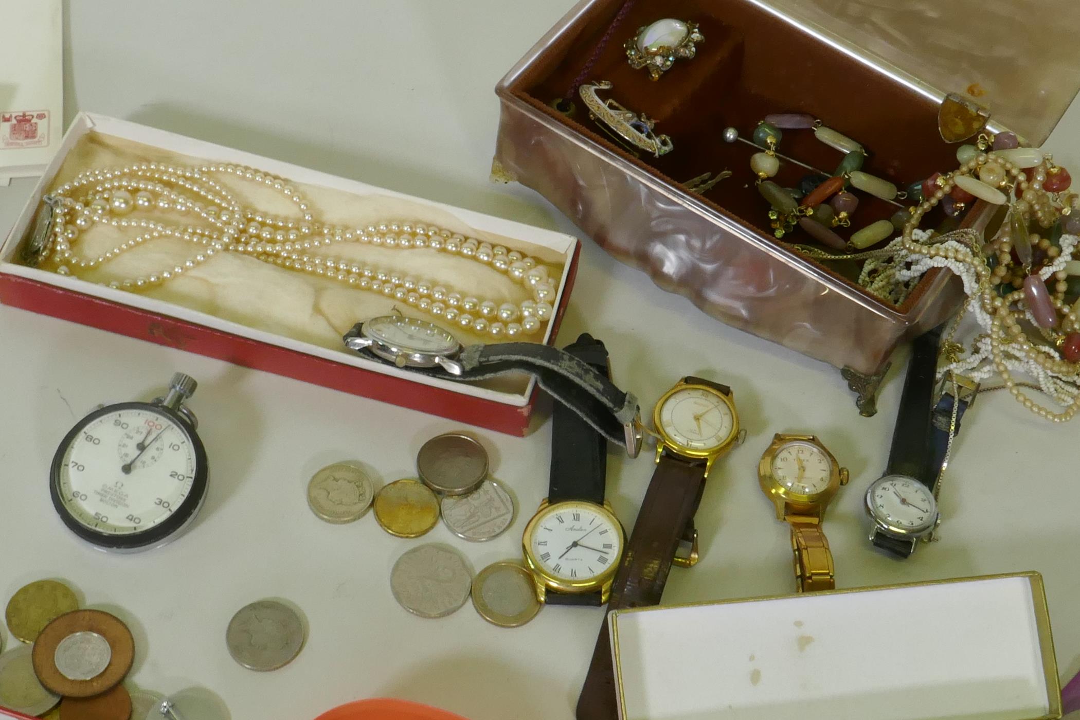 A quantity of UK and world coins, costume jewellery, stamps, cigarette cards, watches, Omega stop - Image 6 of 6