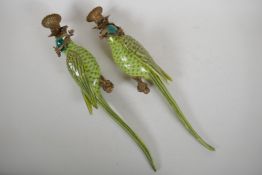 A pair of polychrome porcelain and ormolu mounted parrot wall sconces, 48cm high