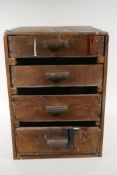 A rustic workshop tool chest of four drawers, 33cm x 36cm, 46cm high