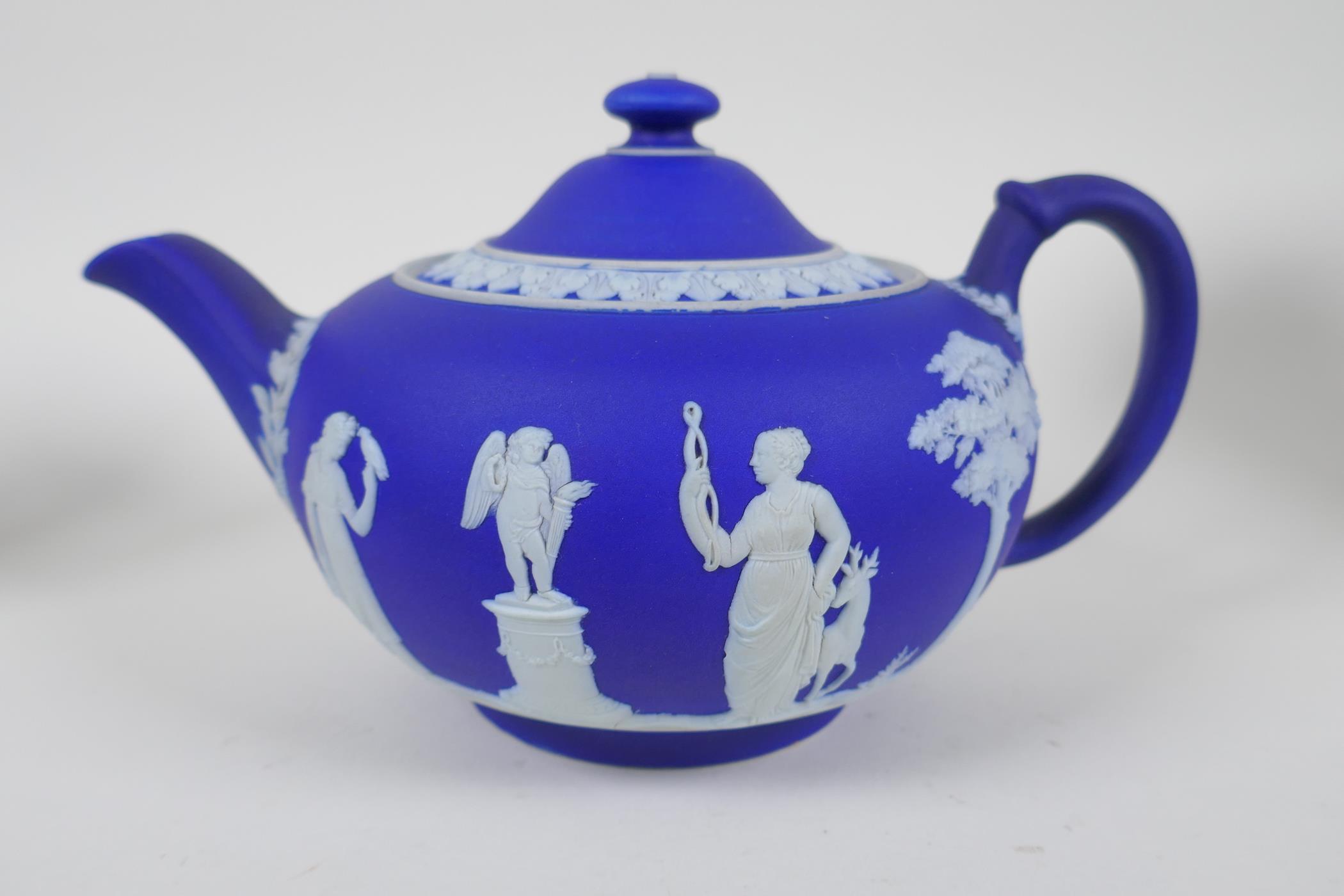 A collection of Antique Wedgwood Jasperware including a teapot, jugs, saucers, vases etc, AF, teapot - Image 2 of 8