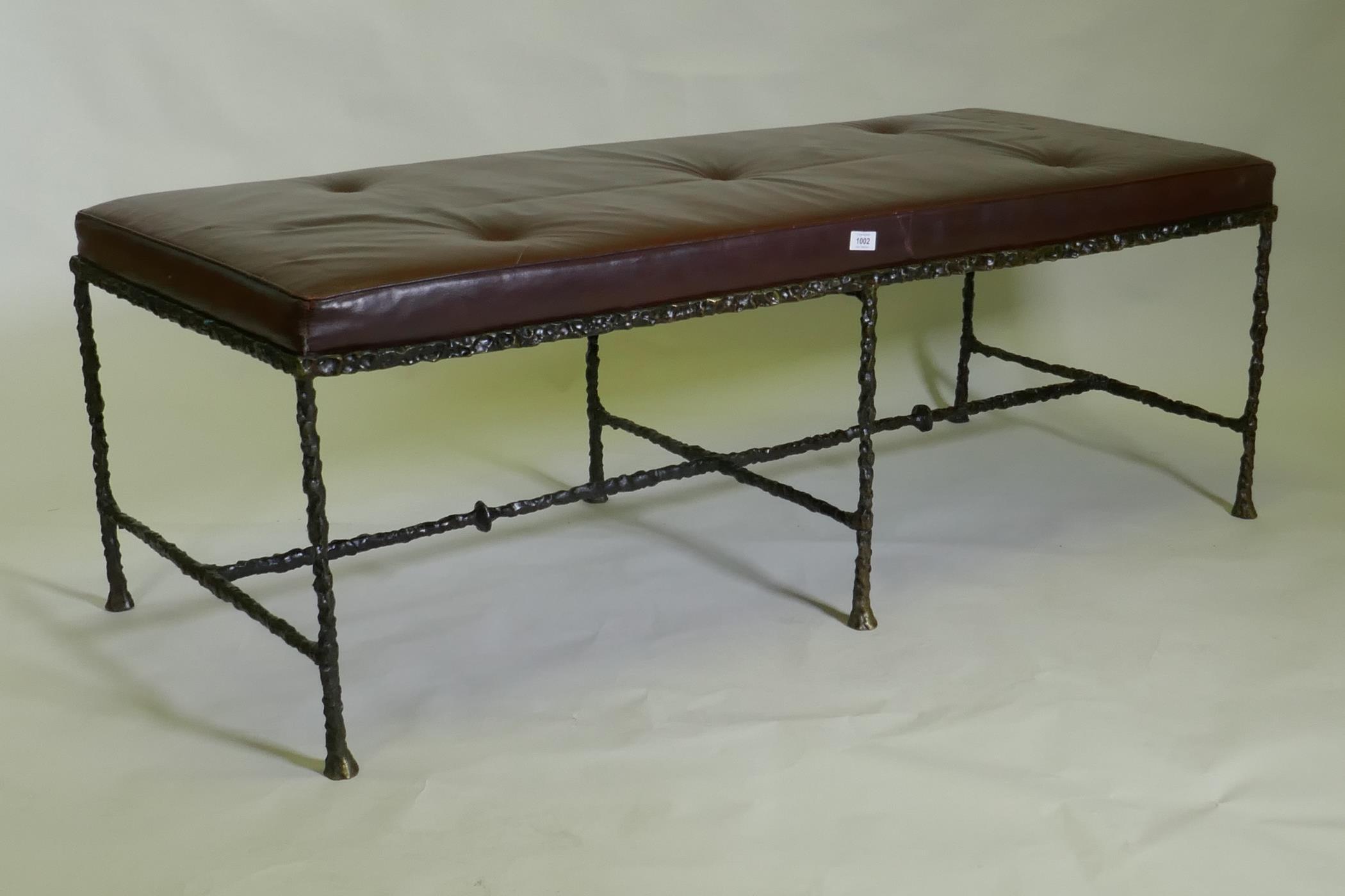 A contemporary bronze based leather hall settle, 150 x 60cm, 50cm high