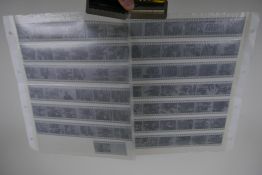 Two sheets of 1960s/70s risque negatives, 35mm, 79 images