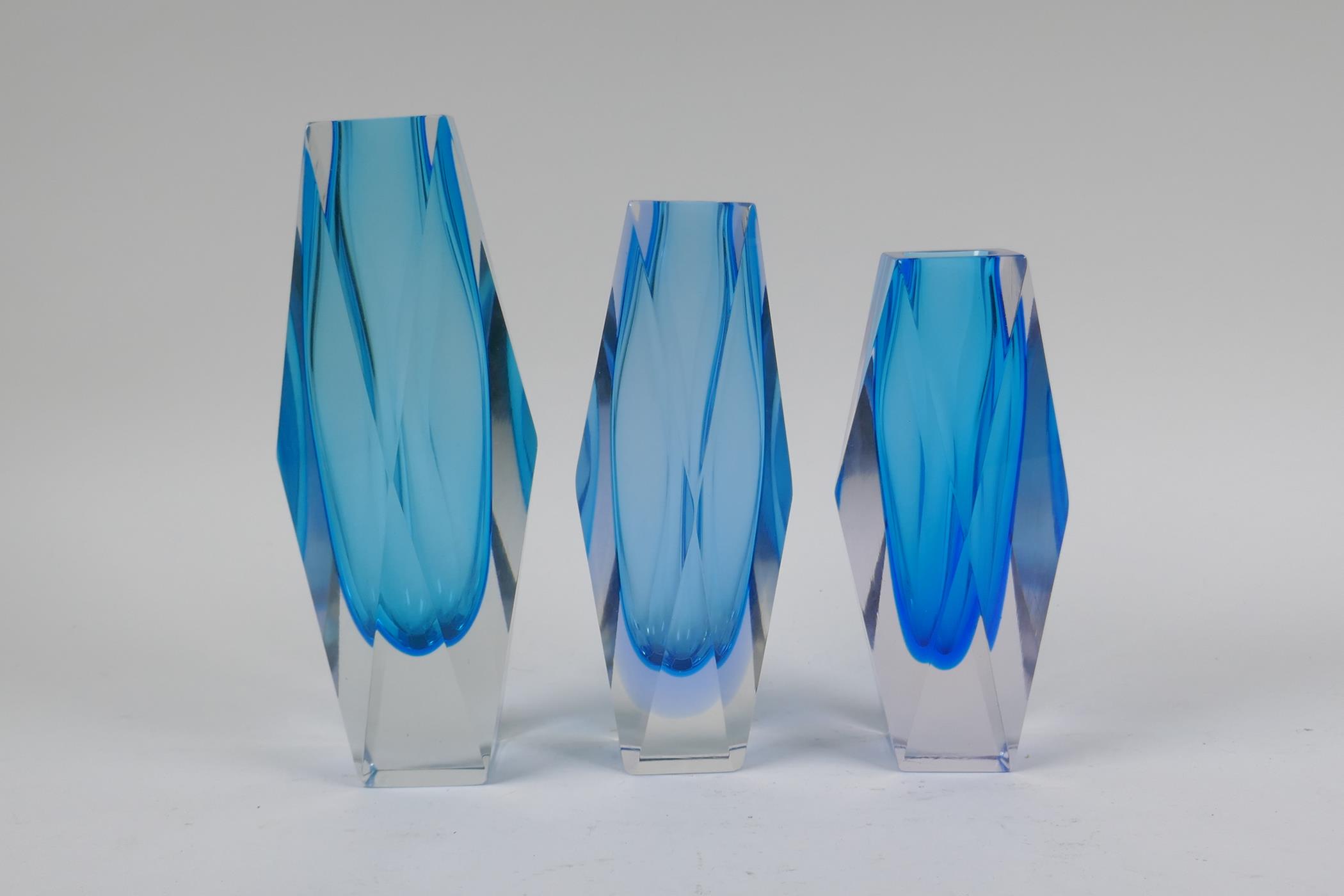 Three 1960s graduated and faceted Murano 'Sommerso' glass vases, unmarked, largest 21cm high