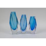 Three 1960s graduated and faceted Murano 'Sommerso' glass vases, unmarked, largest 21cm high