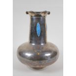 An Art Nouveau white metal vase with lobed rim and set with turquoise style cabochons, 25cm high