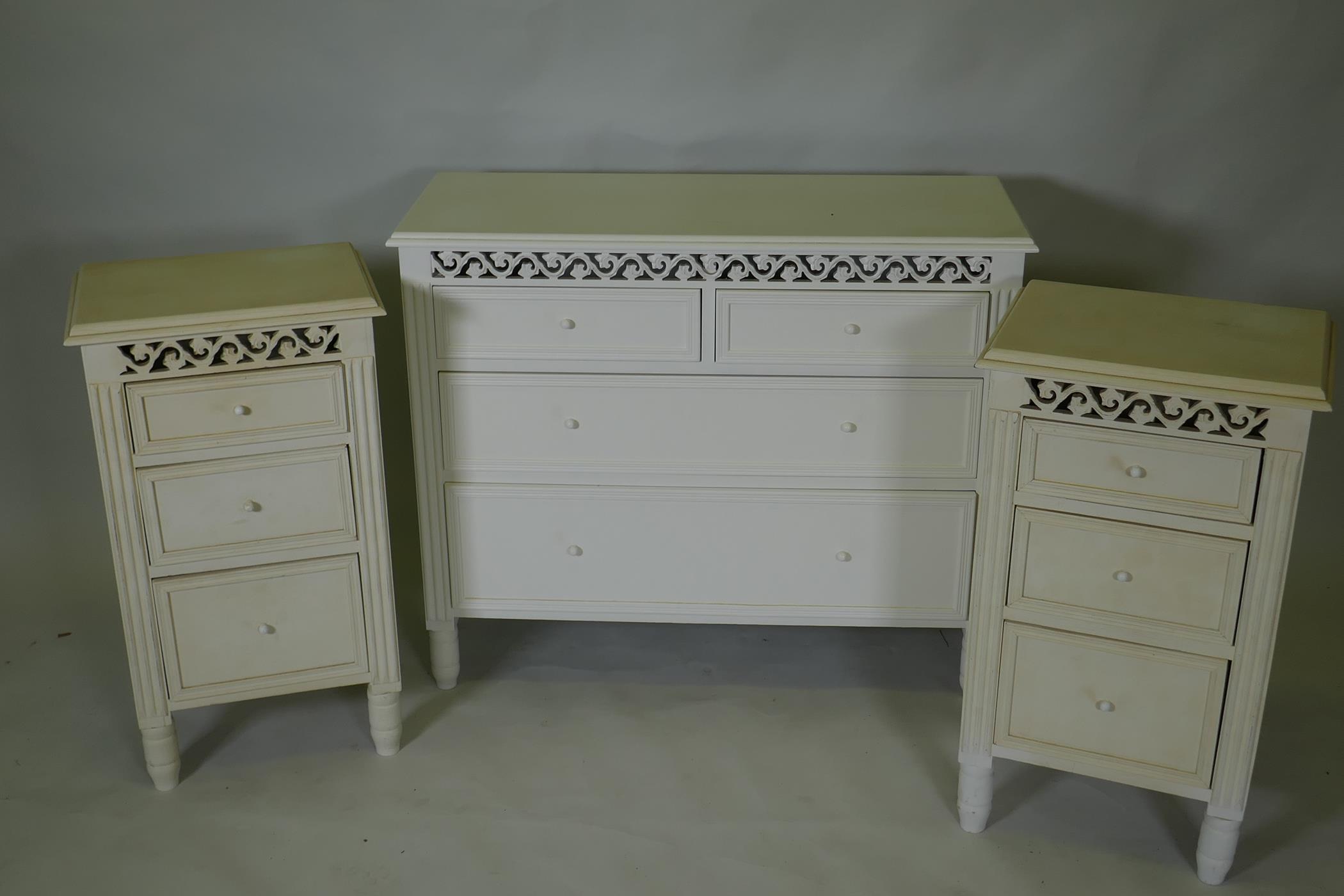 A painted bedroom suite, two three drawer bedside cupboards, 17cm high, and a chest of drawers, 90 x - Image 2 of 2