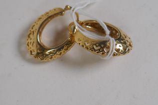 A pair of 18ct gold pierced hoop earrings, 10.4g