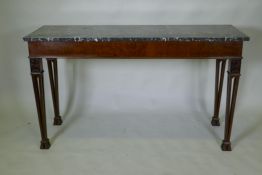A mahogany Chippendale style serving table, with marble top and blind frieze, raised on pierced