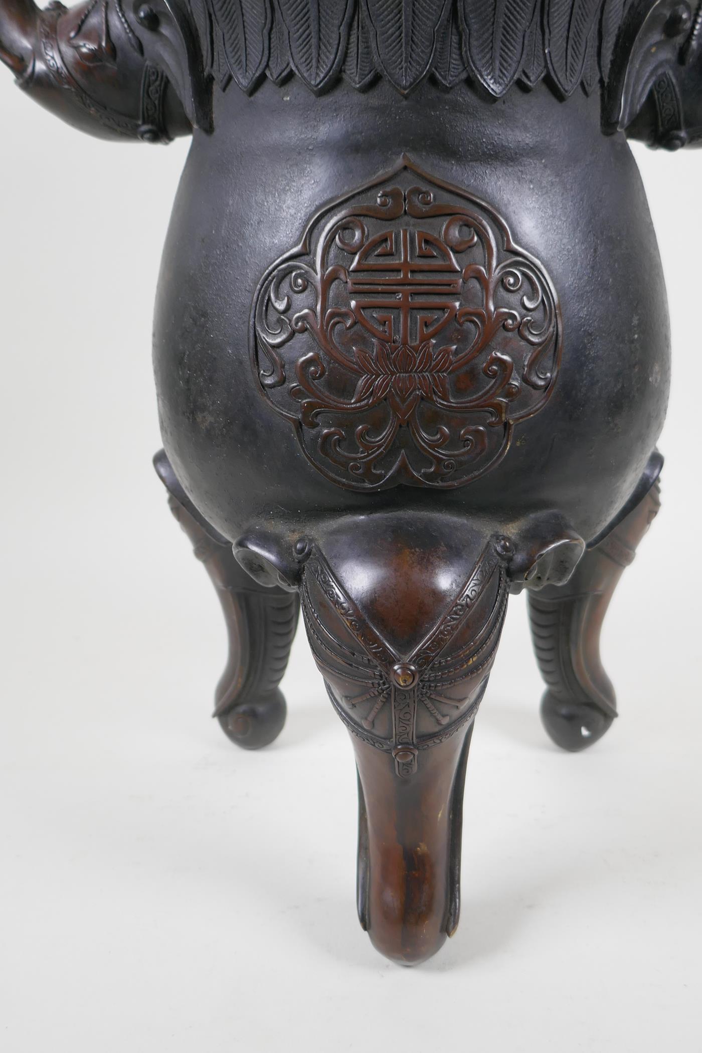 A Chinese bronzed metal two handled censer and pierced cover, raised on elephant head tripod - Image 2 of 8