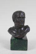 A Greco-Roman style bronze bust, 14cm high