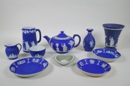 A collection of Antique Wedgwood Jasperware including a teapot, jugs, saucers, vases etc, AF, teapot