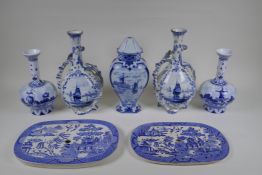 A pair of Delft Royal Bonn porcelain vases with two handles, together with two Delft slender