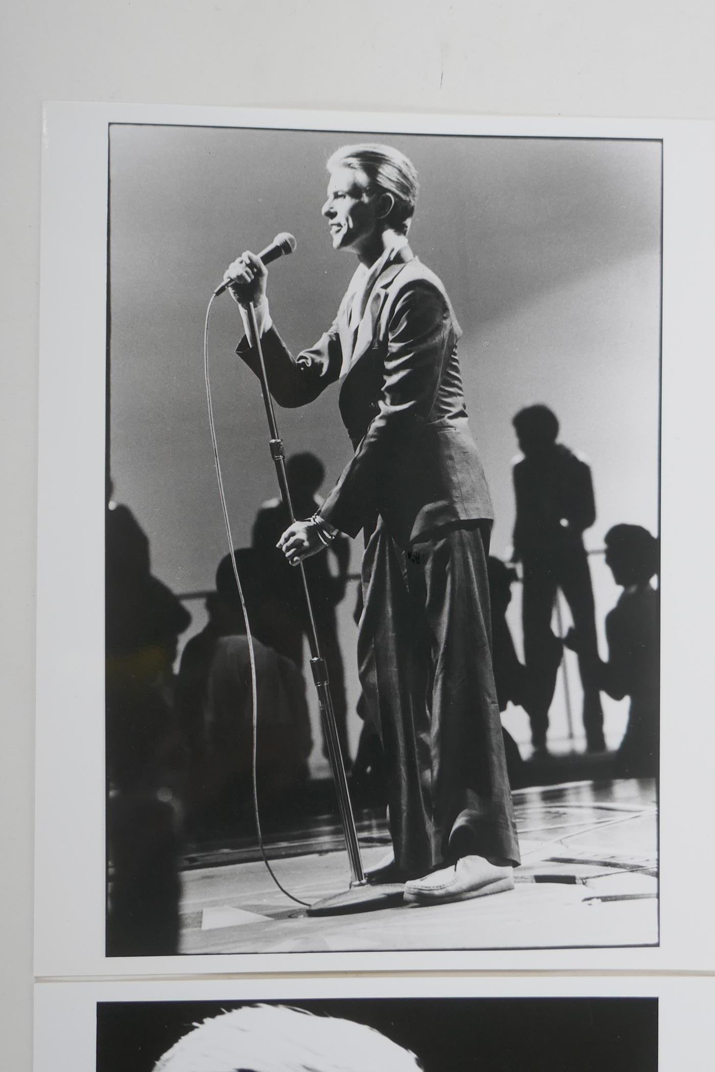 Four 1970s black and white press photographs of David Bowie, all with London Features - Image 2 of 9