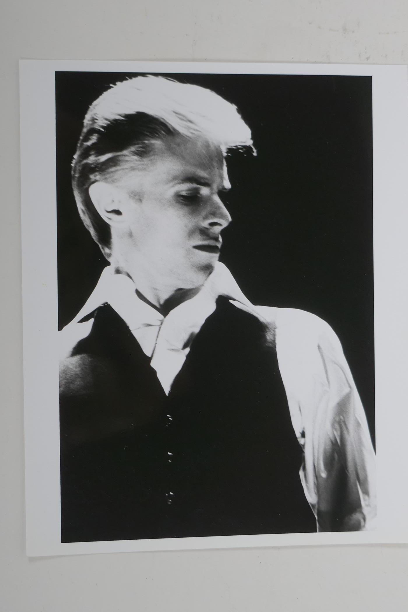 Four 1970s black and white press photographs of David Bowie, all with London Features - Image 6 of 9