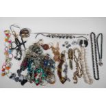 A quantity of assorted costume jewellery to include necklaces, bracelets and earrings