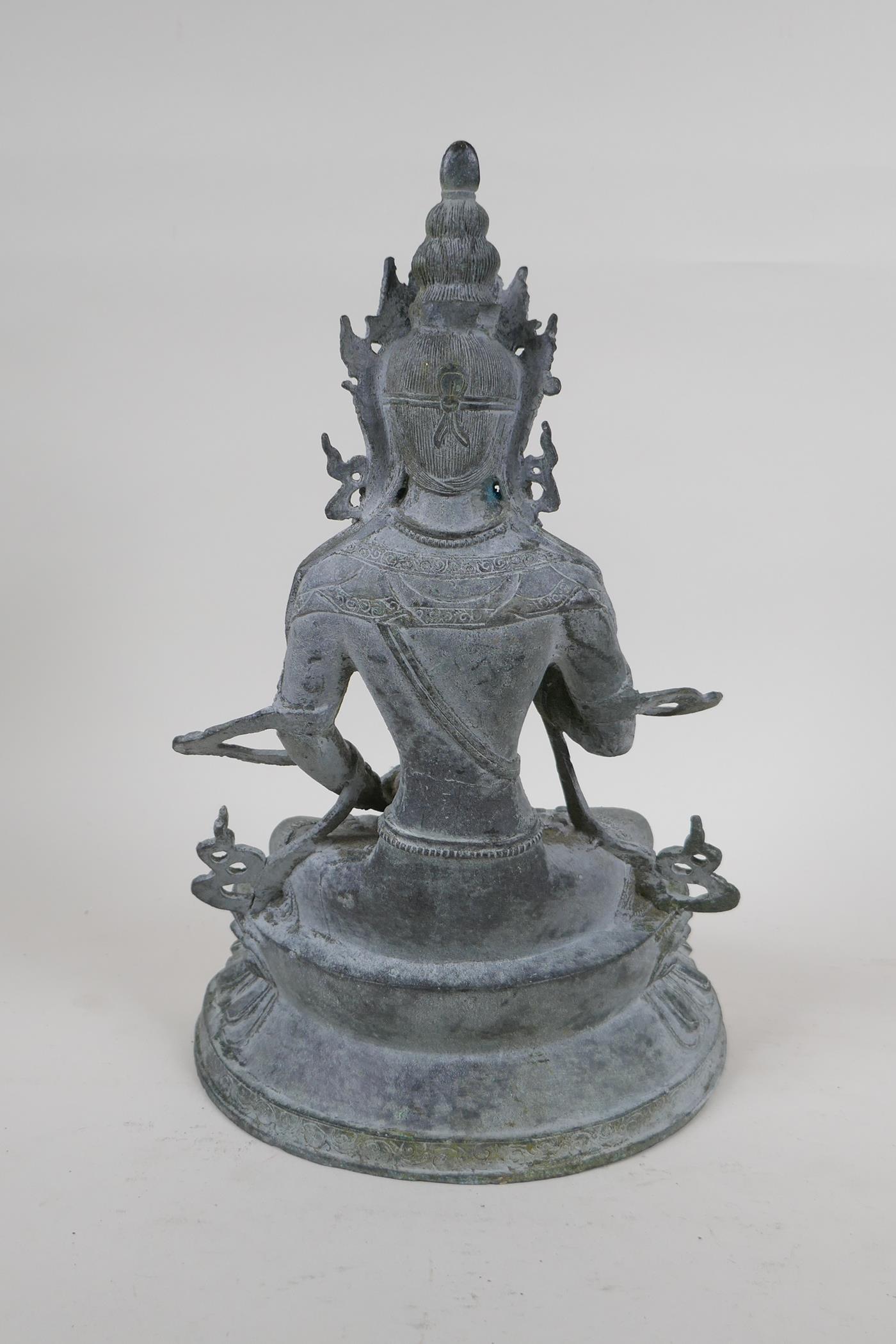 A Sino Tibetan bronze figure of Buddha, with ver de gris patina, 33cm - Image 3 of 4