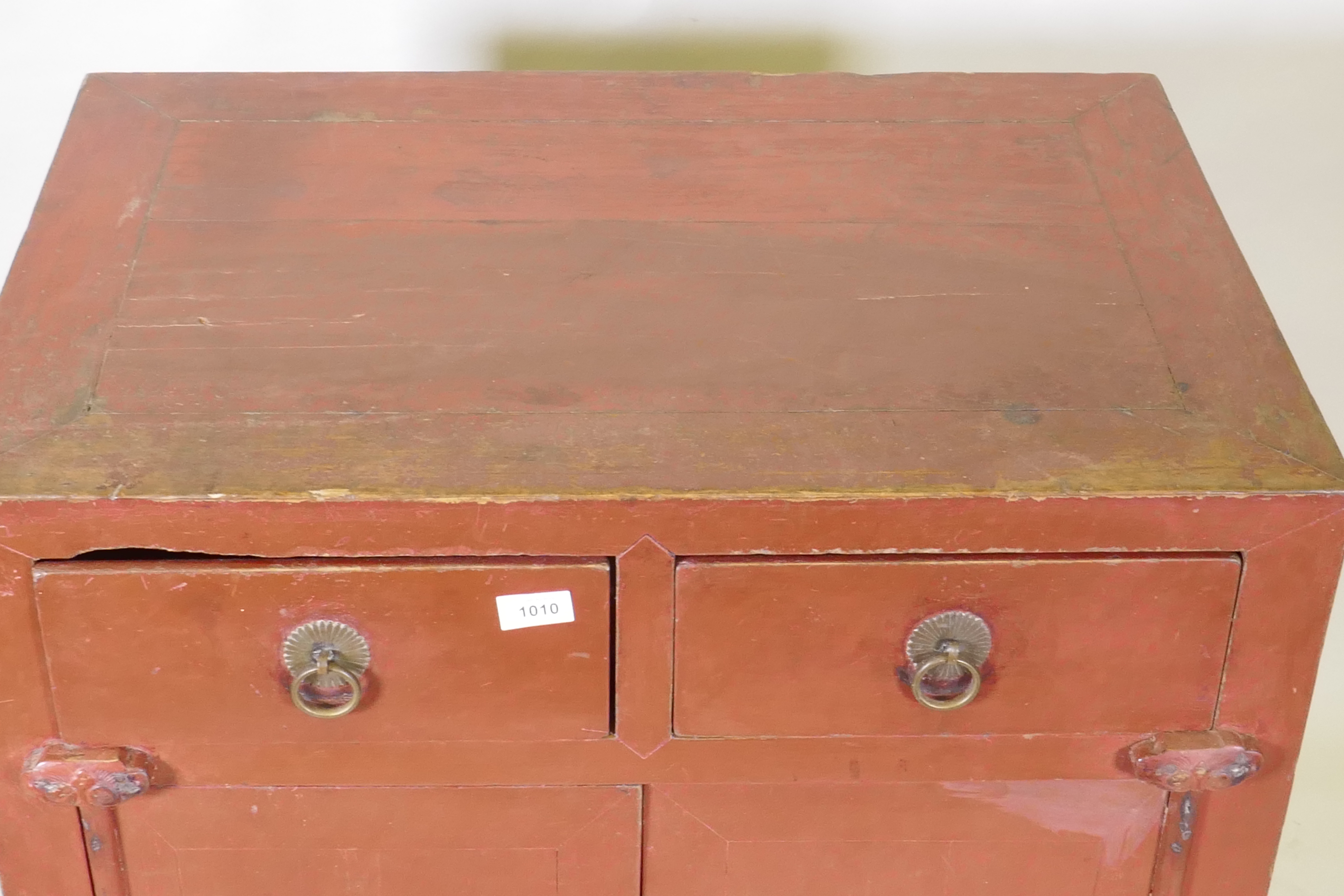 A Chinese red lacquered wood cabinet with two drawers over two doors, 74 x 50cm, 87cm high - Image 3 of 5