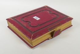 A Victorian leather bound photograph album, 30 x 23 x 6cm