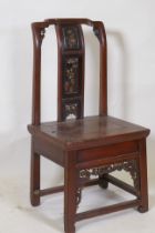 A Chinese hardwood low chair with carved and gilt back splat, 78cm high
