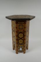 A Damascus marquetry hexagonal topped occasional table, AF losses, 33 x 33cm, 44cm high