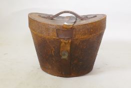 A C19th leather hat box with red silk lining, 26cm high