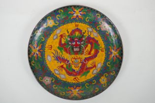 A Chinese cloisonne dish, with dragon and lotus flower decoration, the base decorated with bats
