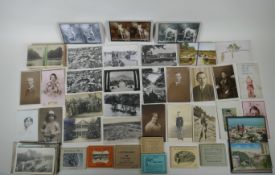 A quantity of early C20th and later postcards, and snapshot albums, mostly topographical, largest 17