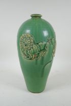 A Chinese celadon glazed porcelain vase with raised kylin decoration, 31cm high