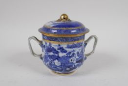 An C18th Pearlware two handled jar and cover, decorated with the Willow pattern, with historic