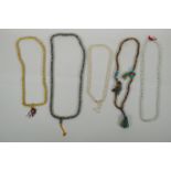 Five strings of Tibetan Mala beads, including bone, nut kernel and glass beads, 82cm longest