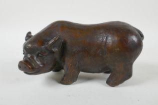 A filled bronze model of a sow, 19cm  long