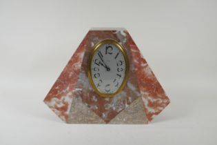 An Art Deco French rouge marble mantel clock with an eight day brass movement, 24cm high