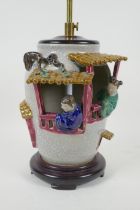 A Chinese crackleware lamp decorated with figures in windows, 32 x 38cm high, AF