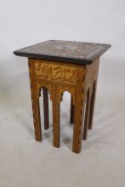 An antique Islamic occasional table with marquetry and mother of pearl inlaid decoration, with
