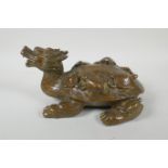 A Chinese filled brass longgui (dragon turtle) with tortoise on its back, Xuande 6 character mark to