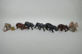 A quantity of carved stone, wood and composition African animals, largest 16cm