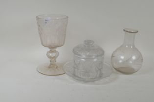 A Victorian cut glass jar and cover with dish, a carafe and etched goblet, 22cm high