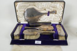 A cased hallmarked silver dressing table set, engraved to backs 'Beryl', maker S. Blanckensee &