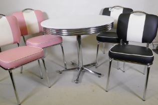An American vintage style table and four chairs with chrome frames and vinyl covers, table 90cm