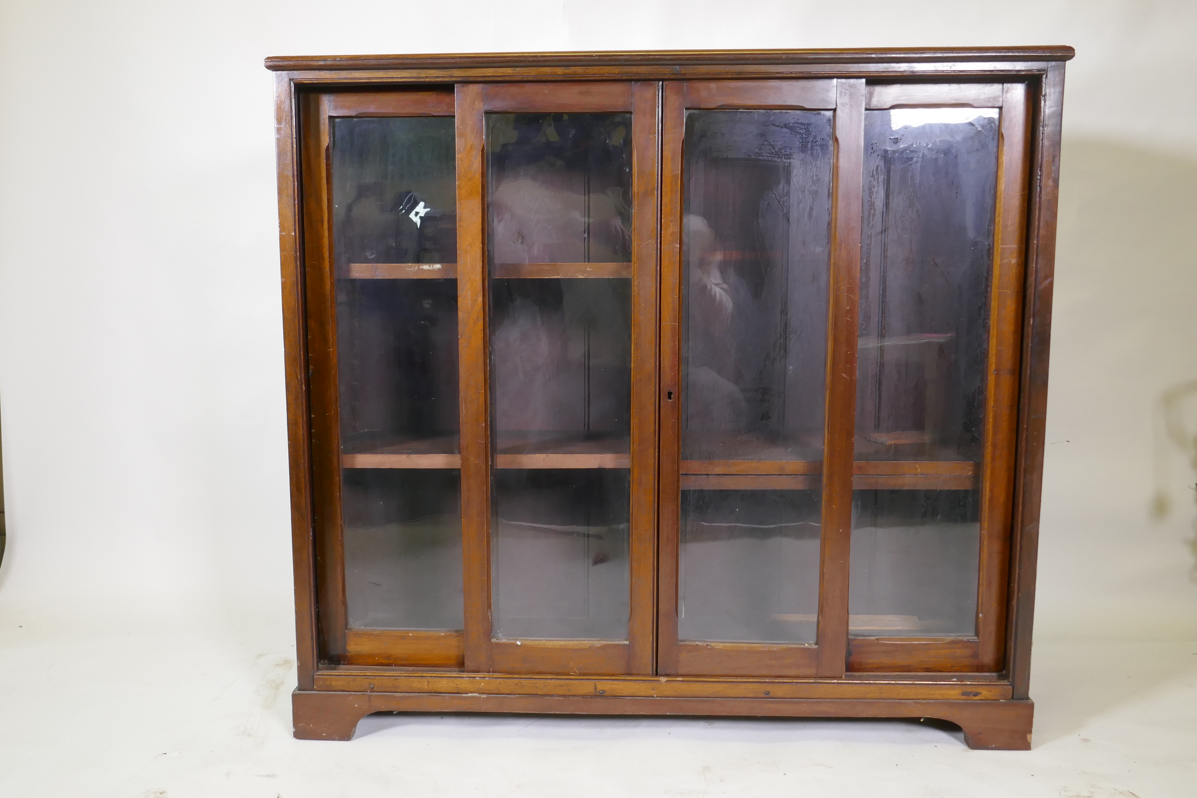 A mahogany bookcase with four sliding glass doors, 110 x 30 x 101cm - Image 2 of 2